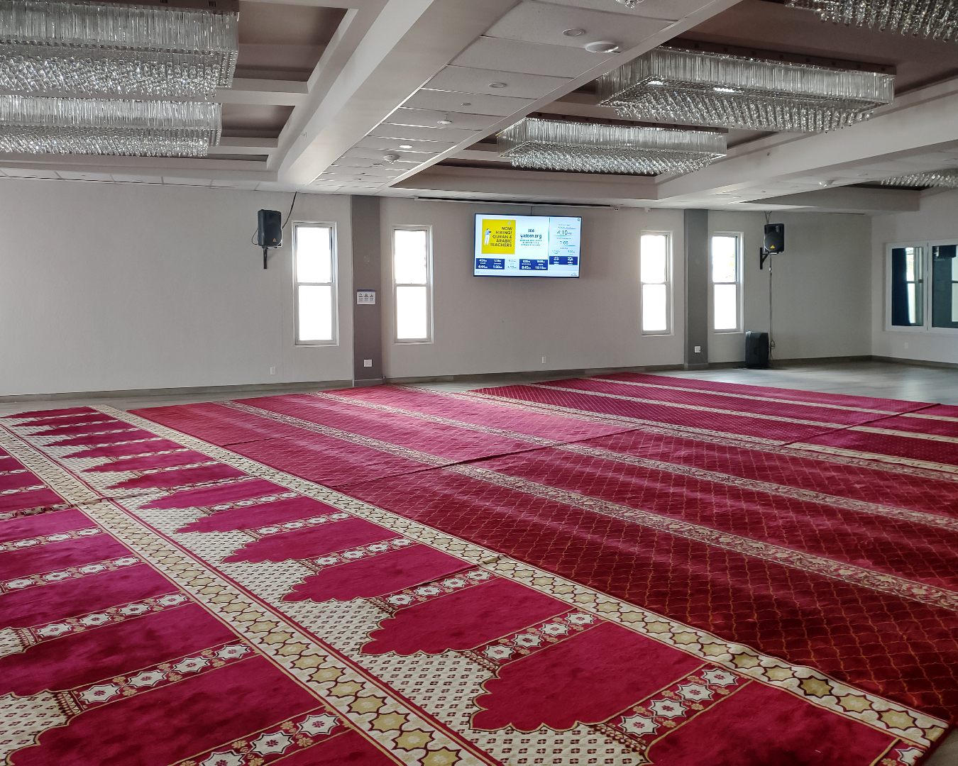 Georgia Windows & Doors white aluminum sash windows — four narrow vertical units mosque prayer hall commercial installation Burlingame California